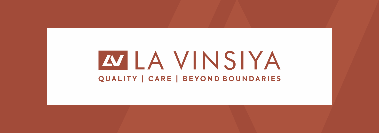 La Vinsiya logo lockup in white on a warm terracotta field